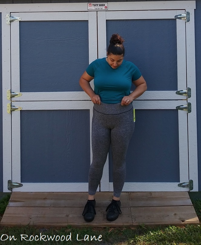 athleisure outfit with short sleeve teal t-shirt, gray active leggings and black sneakers On Rockwood Lane
